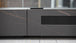 WUPRO Cinema Rock Panel Customisable Laser TV Cabinet for UST Projector Black and Gold Details Actual Photo